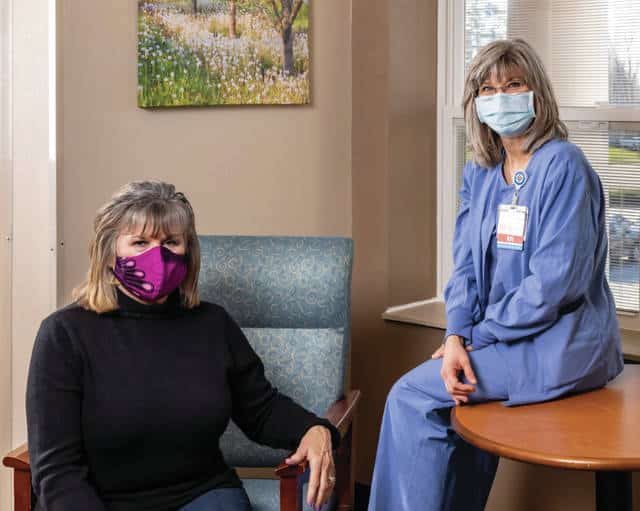Carol Pounds, left, talks with Suzy Vagedes, RN, at Hyatt Surgery Center in Tipp City.